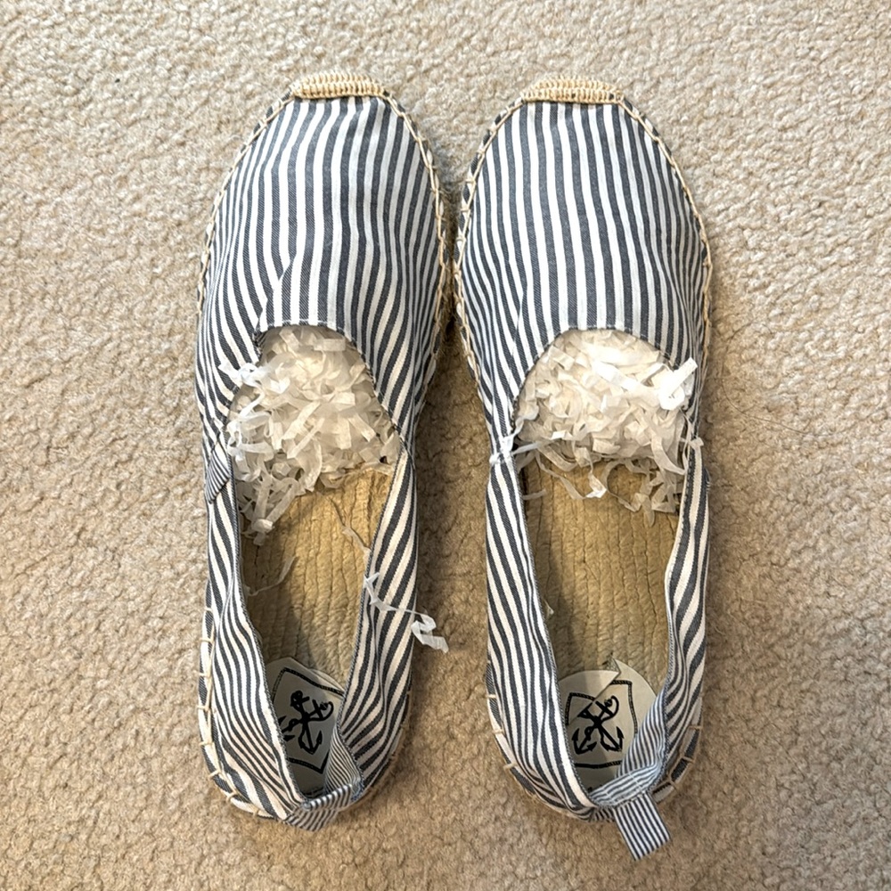 Men’s shoe - blue and white striped cloth with raffia bottoms.